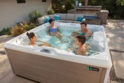Hot Spring Pulse - 7 Person Hot Tub -Pooly Shop hotspring limelight 2018 pulse alpinewhite coastal gray lifestyle family 02
